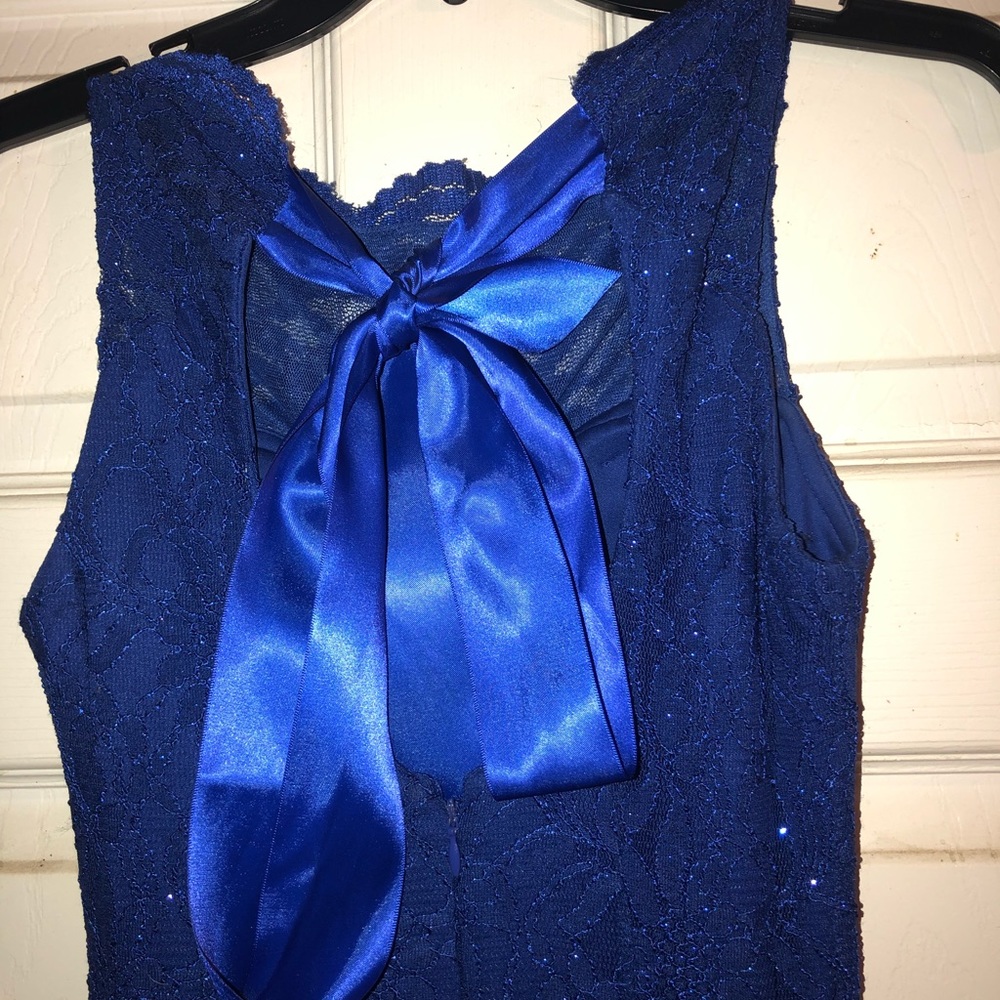 Long dark blue sparkly prom dress.